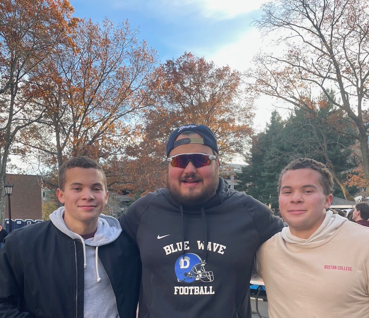 DHSBWfootball's tweet image. Blue Wave Football coaches Erle Ladson and Kyle Amann celebrating a GT win with Blue Wave alumni Kevin Roche, Harry &amp;amp; John Rooney up at BC. #bluewavepride #rollwave