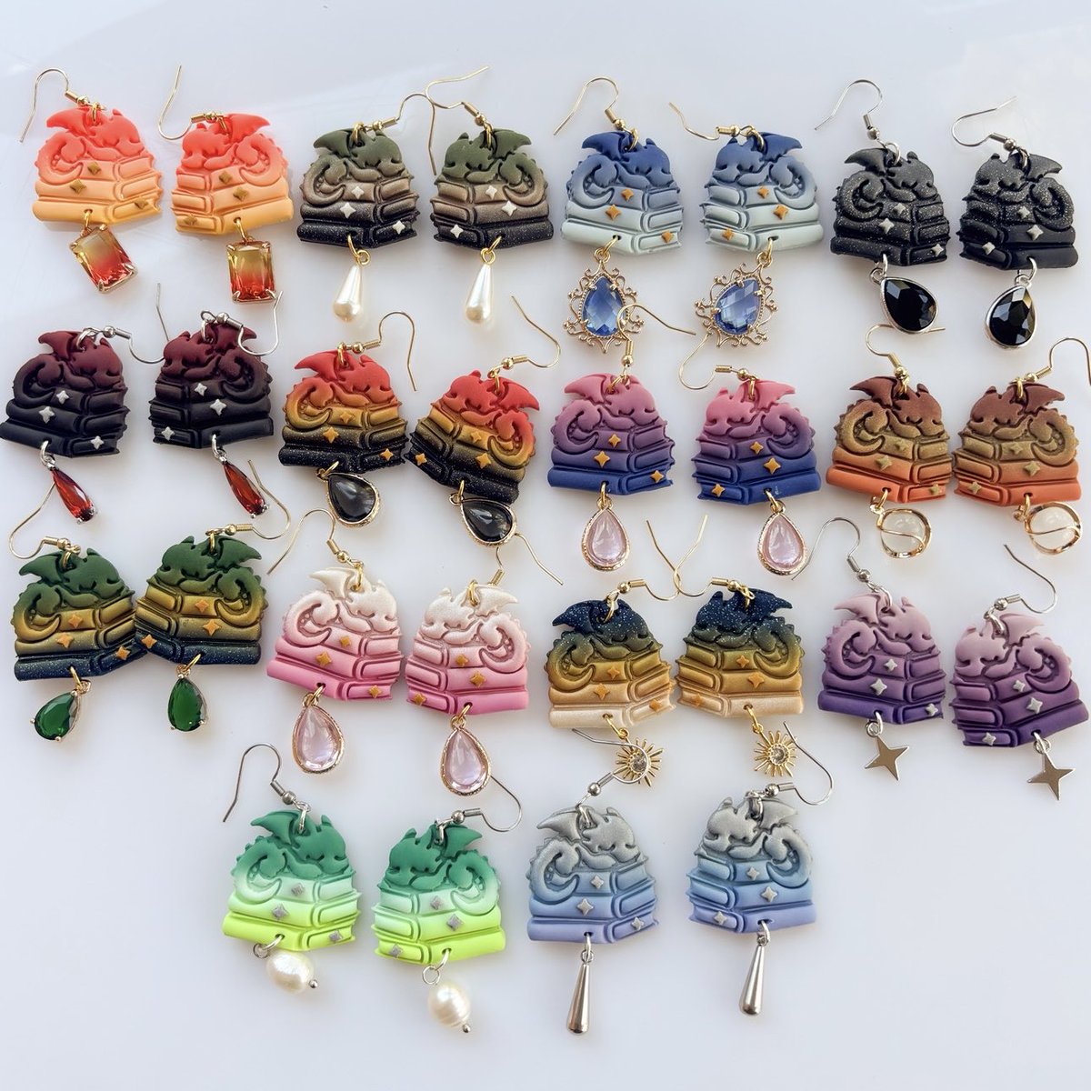 peripheralUS's tweet photo. it cost $0.00 to support an artist and her quirky little book dragon earrings🥹💕 https://t.co/q6Y6meg6eo