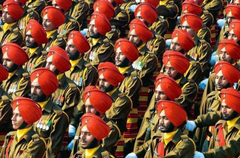 Right through from Vijay Chowk to Red Fort, all contingents salute only once - they salute the President Of India, the Sikh Regiment salutes twice. 

The second salute is to Gurudwara Sis Ganj. The sewadars in return shower rose petals on the brave Sikh soldiers.
