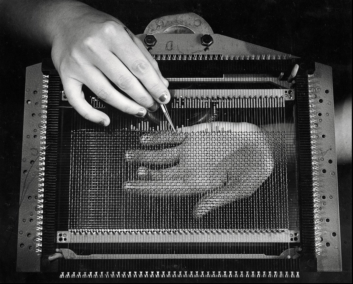 aethersovereign's tweet image. before microchips, 
there were miles of wire, and 
every bit was stitched by human dexterity!

‘Hands weaving magnetic-core memory, 
IBM, Poughkeepsie, New York’ (1956)
by Ansel Adams
