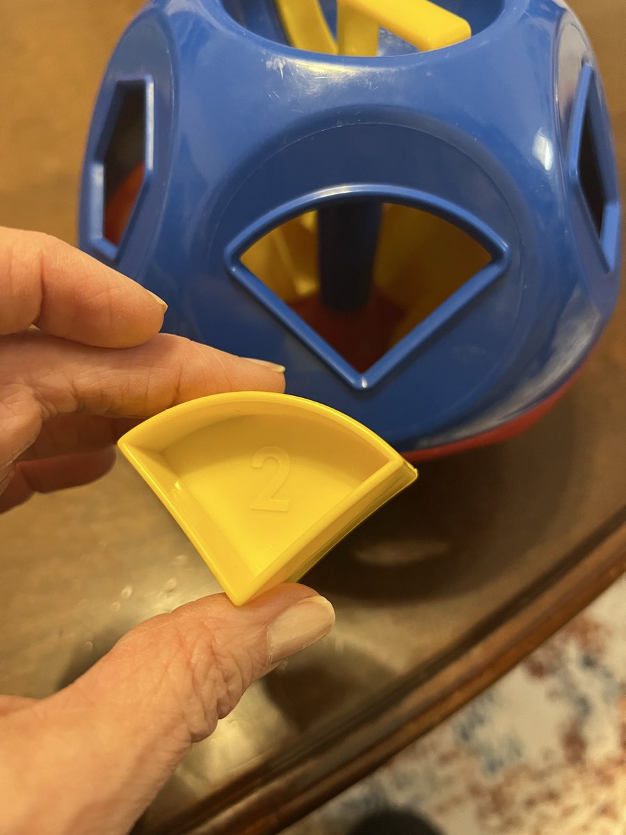 As my grandson was putting shapes into this shape sorter toy, he was naming the shapes: “circle, square, baseball field….” 😂