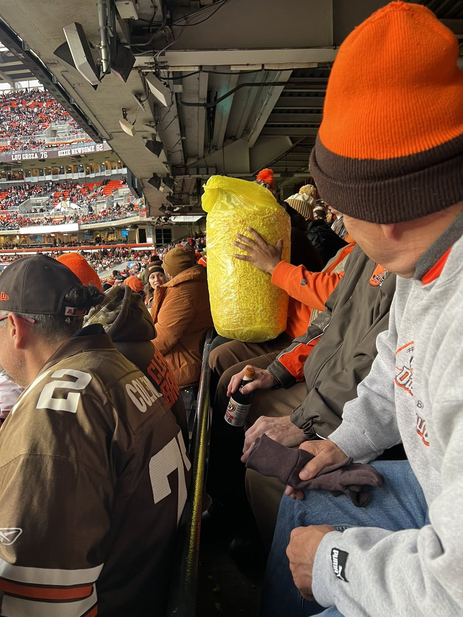 this bag of popcorn is being passed around the dawg pound rn