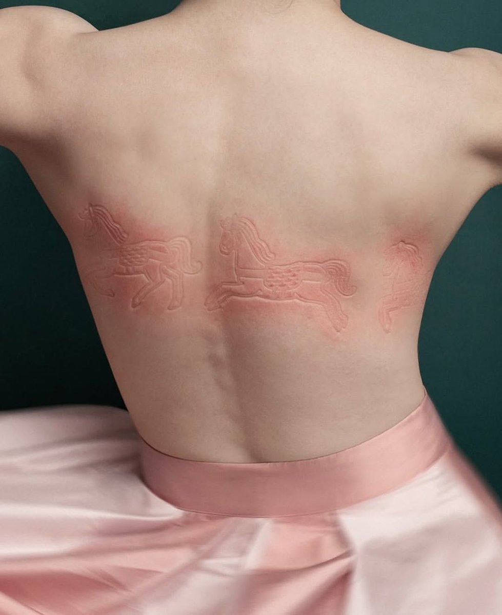 rogue's tweet image. Iness Rychlik’s “Skin” series