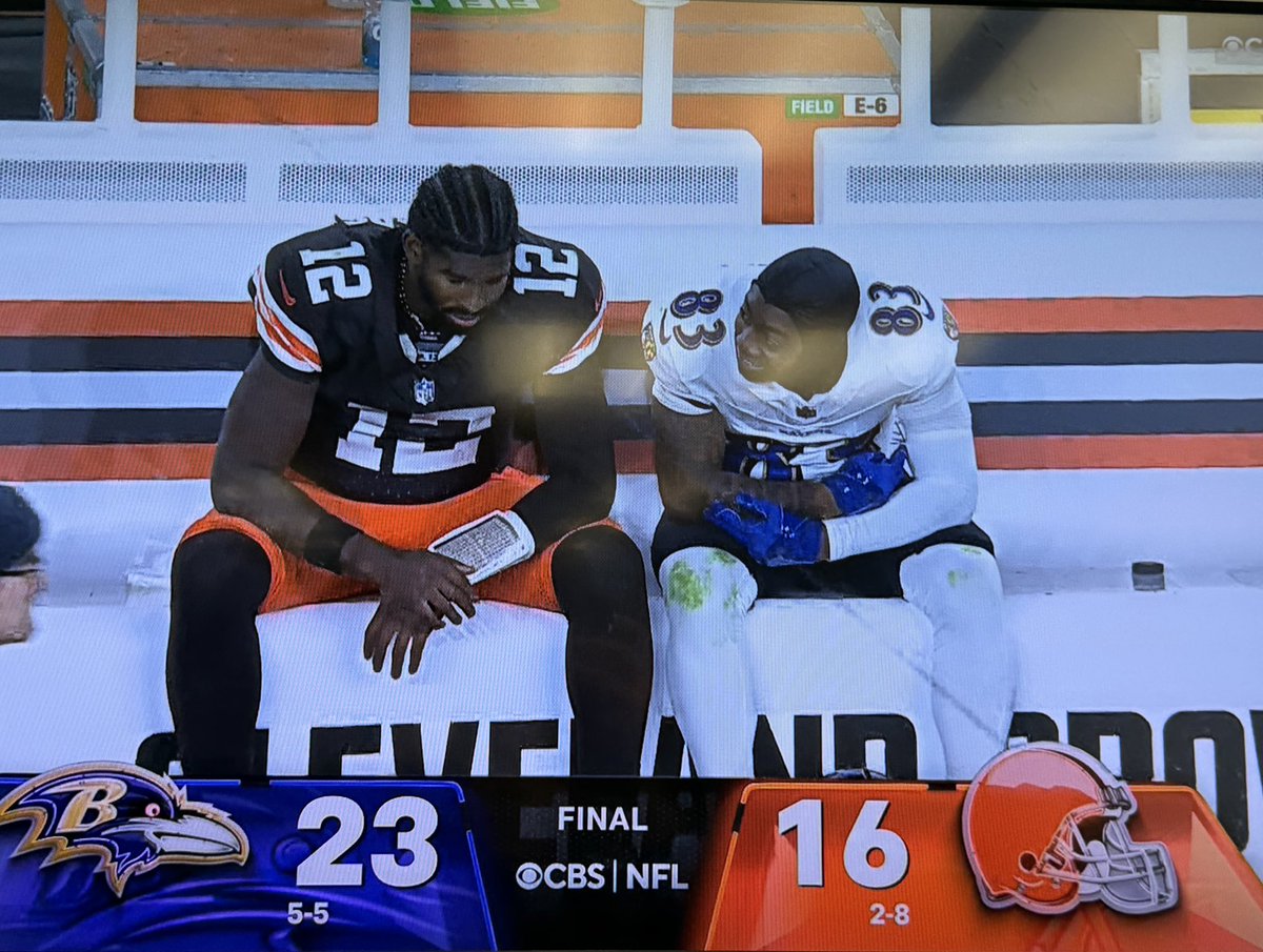 AshNoelleTV's tweet image. Shedeur Sanders and LaJohntay Wester share a moment after the game.