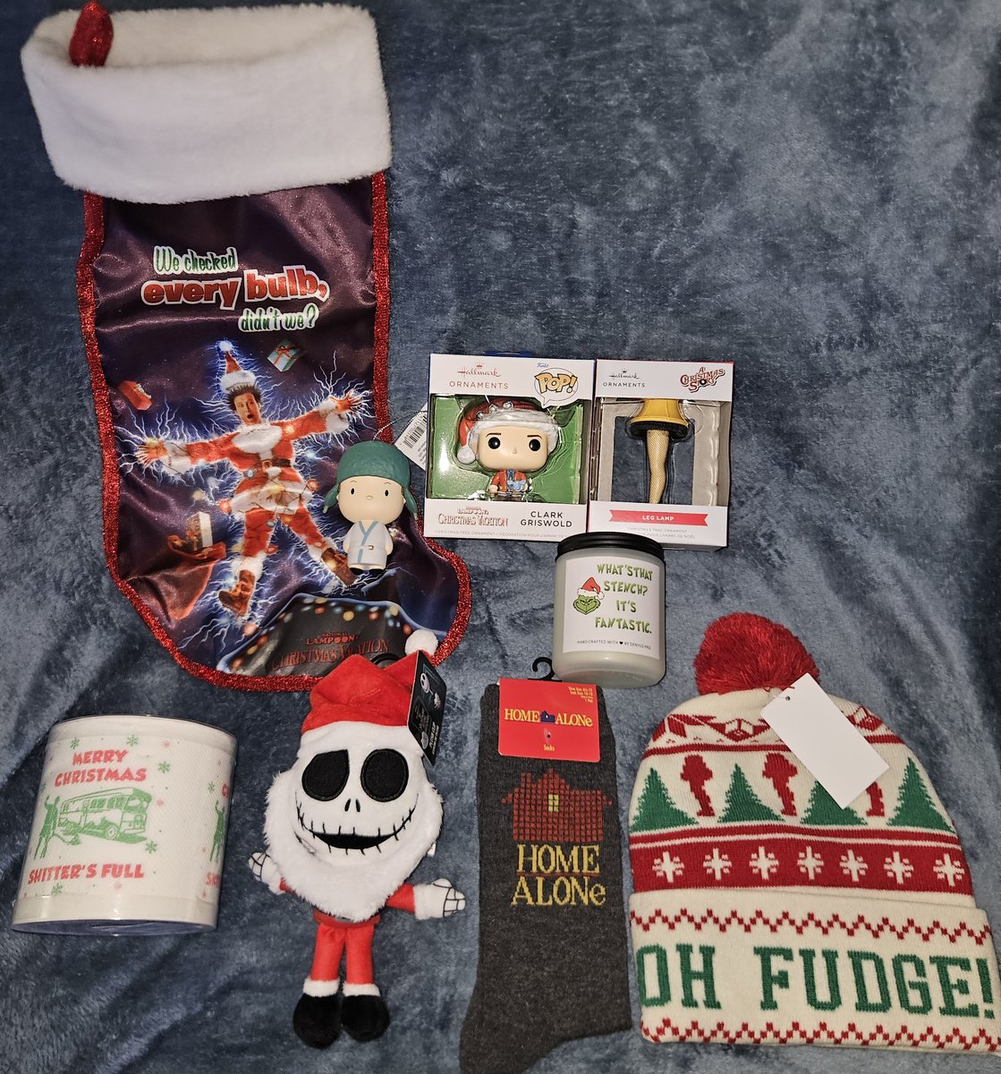 I can't wait anymore, it's time to announce the final of 3 holiday giveaways!

The prize, a Christmas movie stocking stuffer package that  includes:

--Christmas Vacation stocking and decorative toilet paper
--Clark &amp; Couisin Eddie Hallmark ornaments
--A Christmas Story Lamp Leg