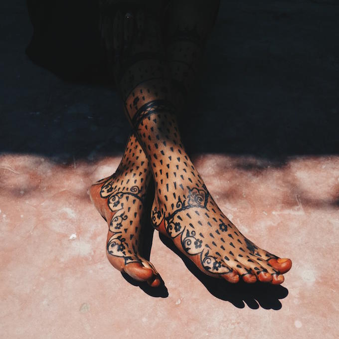 'Bride’s feet decorated with henna at a Swahili wedding' by Sarah Waiswa, contemporary Ugandan-born, Kenya-based documentary and portrait photographer #womensart