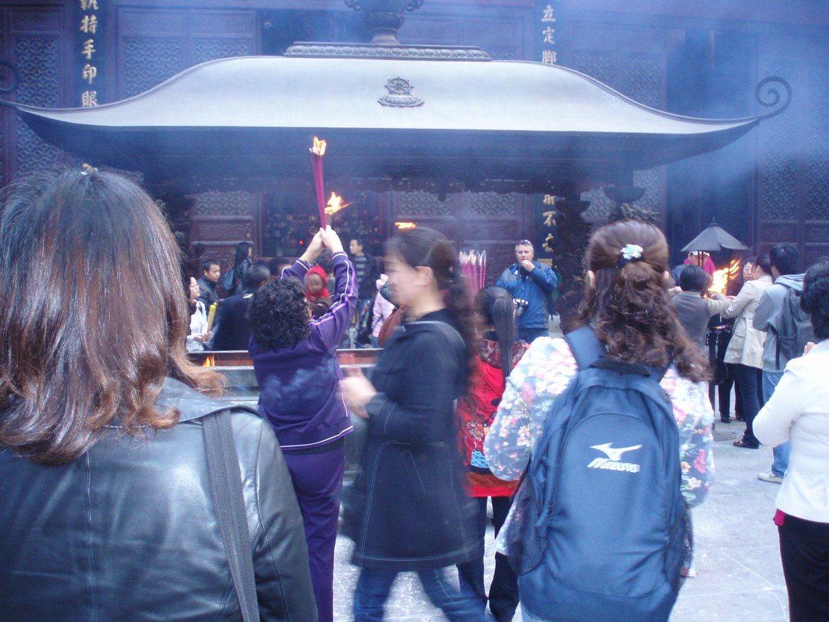 Spot the gringo.   Somewhere in China....I don't even know where (I think Sichuan Provence).  I was all over the place for a few years and in a constant haze.  My biz partner must've took this one.