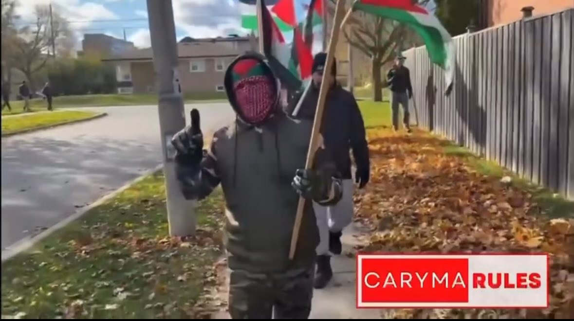 KevinVuongxMP's tweet photo. “They weren’t dressed as terrorists… you’re a notorious anti-Palestinian racist”

Meanwhile, this was Abu Obeida, spokesman for designated terrorist group Hamas vs the terrorist cosplayer:

— Same gesture
— Same face covering &amp; costume
— Same Islamist ideology https://t.co/gpHr98eNVv
