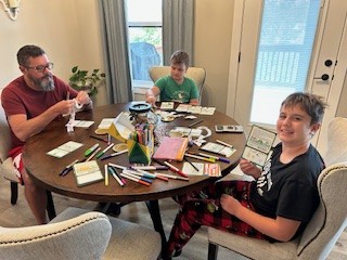 Trees4Troops's tweet image. At the Harrison, AR FedEx facility, employees and families handwrite tree tags for donated Christmas trees. One family completed 75 tags in one afternoon. Small notes, big impact. 💜🎁

What message would you write to a military family?

#TreesForTroops #FedExCares