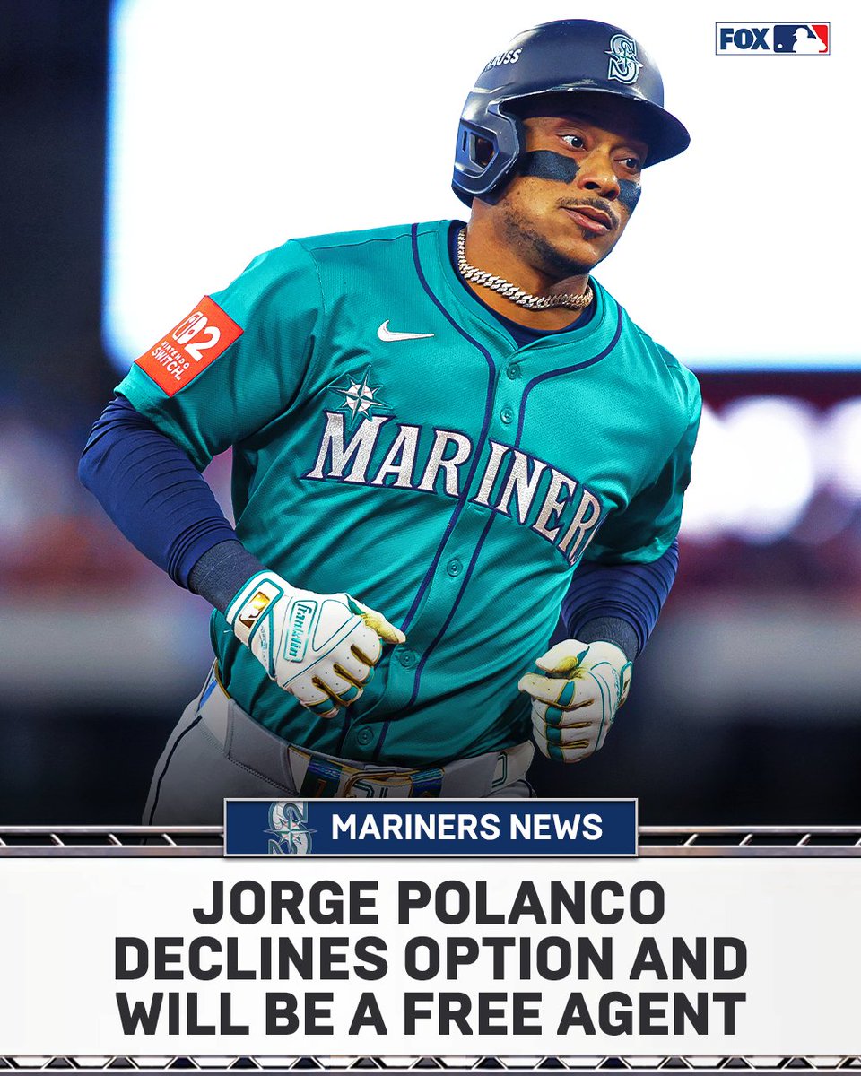 Jorge Polanco stands on a baseball field wearing a teal Seattle Mariners jersey with number 32, blue pants, batting gloves, and a helmet with face guard. He has a chain necklace and looks focused. The background includes a blurred stadium scoreboard. A FOX Sports graphic at the bottom reads Mariners News with text Jorge Polanco declines option and will be a free agent.