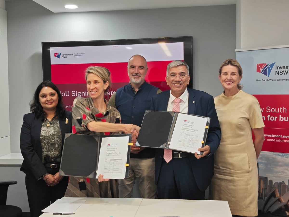 AusCG_Mumbai's tweet photo. The Sydney Coordinated Adaptive Traffic System is heading to India! Karla Lampe, ED of @InvestmentNSW and Prof Manoj Choudhary, VC of @gsv_vadodara , signed an MoU to apply advanced traffic management solutions in India's evolving #smartcity landscape. #SCATS https://t.co/hCMUfq9O9u