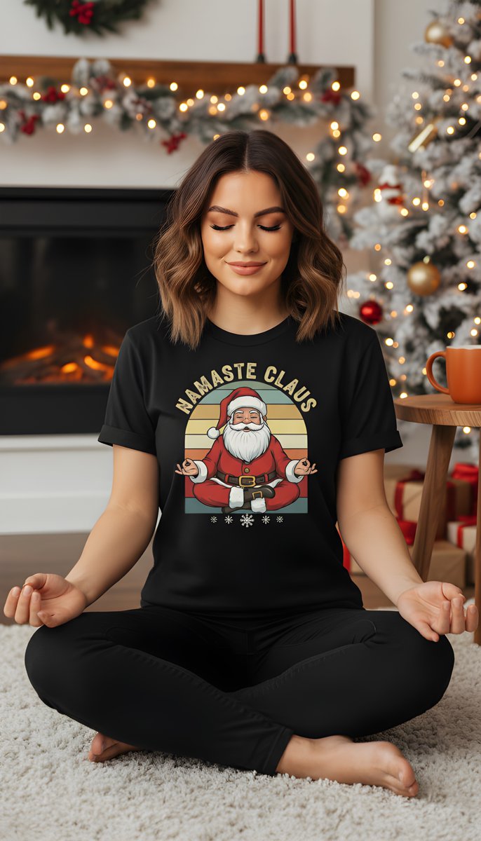 Find your holiday zen with this Namaste Claus yoga t-shirt featuring Santa meditating peacefully in a lotus pose. Perfect for yoga lovers, fitness fans and anyone who loves a funny Christmas twist. bit.ly/43L0gJS

#yogatshirt #wednesdaymotivation #Wednesdayvibe #Shirt
