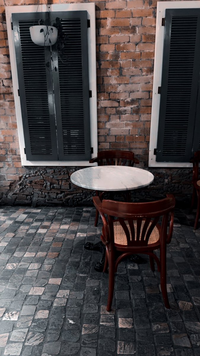 A quiet corner, stories waiting to be shared over coffee ☕✨ #CaféVibes #Aesthetic #CozyCorners #CoffeeTime