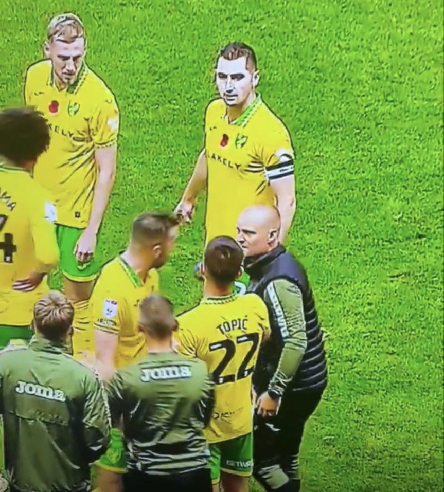 CastCanary's tweet photo. Shane Duffy arguing with Liam Manning on the pitch and hooked at half time, such a good, experienced influence for the football club #ncfc https://t.co/IfzJa2DUuu