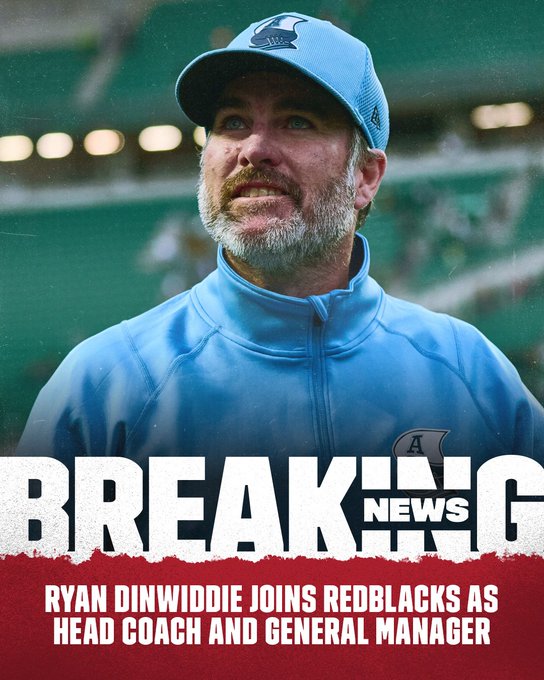 A man wearing a light blue cap with a team logo, light blue jacket with team patches, stands on a green football field with stadium seating in the background. Bold white text overlay reads BREAKING NEWS. Below it, text states Ryan Dinwiddie Joins Redblacks as Head Coach and General Manager.