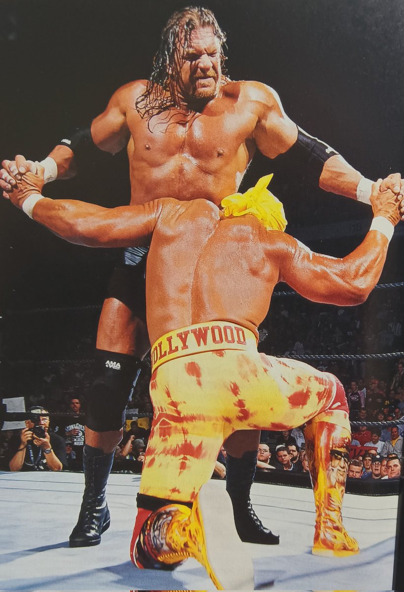 HulkRules4's tweet photo. Hollywood Hogan testing his power vs a younger,formidable force:Triple H(2002) https://t.co/X3QsmV3Yi8