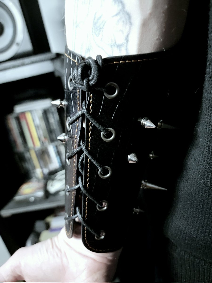 Tombthread666's tweet image. Tombthread Vesper Spines - Arm Guard - pair
Handcrafted gothic armor for the modern dark performer.
Made from black crocodile-pattern leather, set with conical steel spikes and reinforced rivets.
Laced back for adjustable fit, detailed with contrasting dark-bronze stitching.