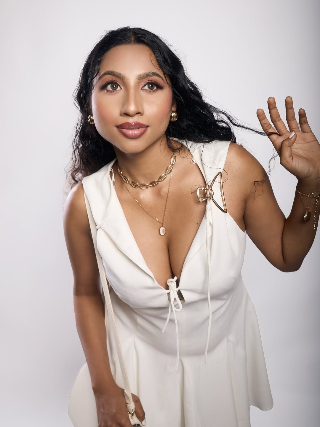 Anjana Mohan in white undergarment / bra that provides support for the bust. It's visible