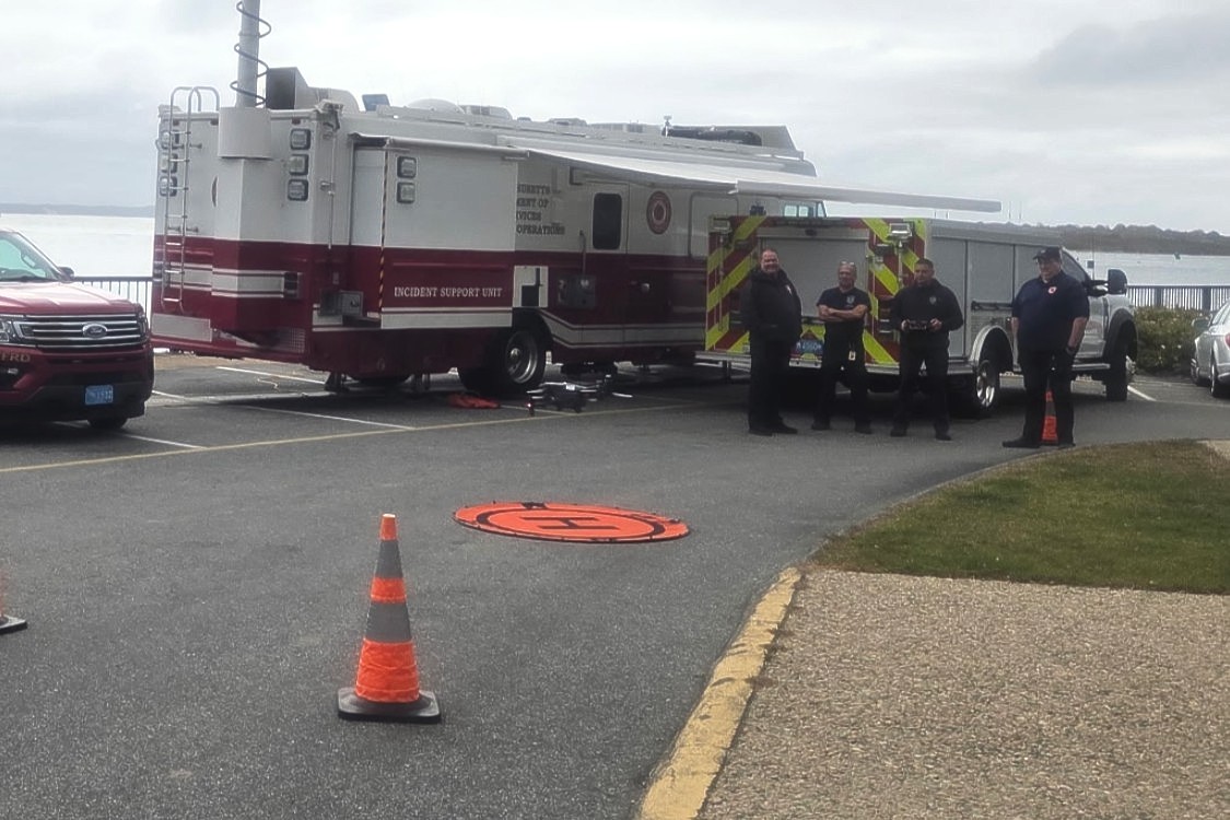 MassDFS's tweet photo. The DFS Special Ops team recently supported @FalmouthFireMA, #MashpeeMA FD, @MassDEP, and other partners for a drill at Woods Hole. An Incident Response Unit provided conferencing, communications, and mapping capabilities, as well as a spot to view footage from one of our drones. https://t.co/n8NWbGtodR