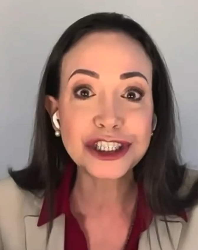 Parrots38's tweet image. Her handlers should tell her to stop making these demonic faces.