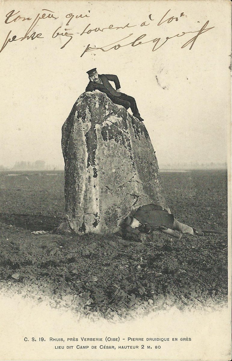 The menhir known as La Demoiselle de Rhuis in Rhuis (Oise) is a little over 3m tall. In 1764 it was recorded as part of a group of six menhirs; by 1789 there were only two and one of those was destroyed in 1793. This card pre-1904.