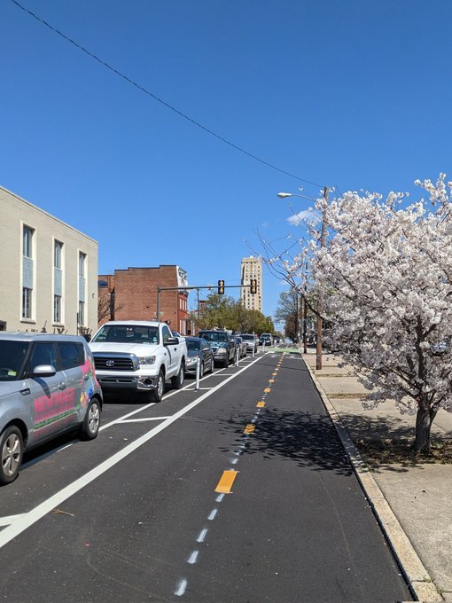 Boenau's tweet photo. Cars are parked for 95% of their life, so they make excellent walls to protect people using bike lanes. https://t.co/HCzL8ihuhW