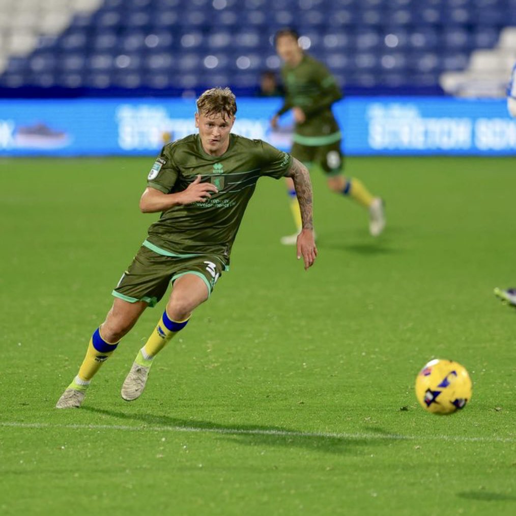 A huge congratulations to former Amber <a href="/Jackgoodman005/">Jack goodman</a> who made his first-team debut for <a href="/mansfieldtownfc/">Mansfield Town FC</a> on Tuesday evening!

Everyone at Basford United is proud to see you progressing. Keep pushing, Goody! 💛🖤

📸 Photo credit: Mansfield Town

#𝐂𝐎𝐘𝐀 || #𝐔𝐓𝐀