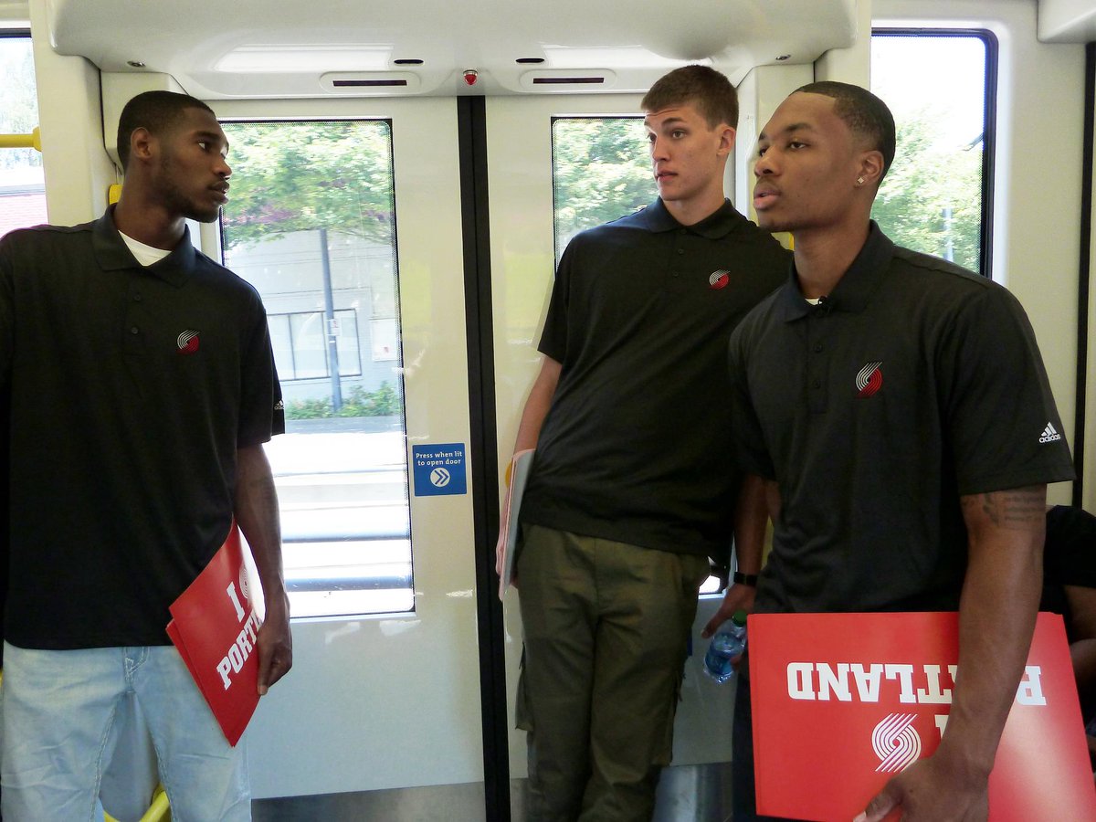 trimet's tweet image. It’s train time ⏰🚈 

Rookie Damian Lillard catching the MAX on July 9, 2012 😍