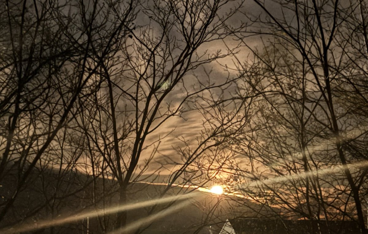 moon and clouds this morning but it looks like the sun and a hill