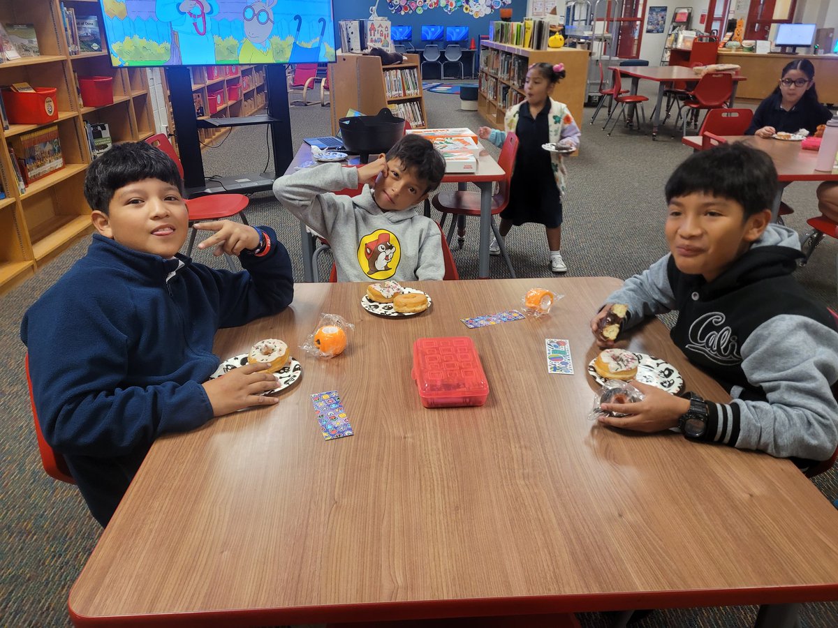 Check out some of our <a href="/LivelyEagles/">Lively Elementary</a> Beanstack winners!! They enjoyed some 🍩, received a small prize and chatted with friends. Great way to start their morning! <a href="/IrvingLibraries/">IISD Libraries</a> <a href="/zoobeanreads/">Beanstack</a>