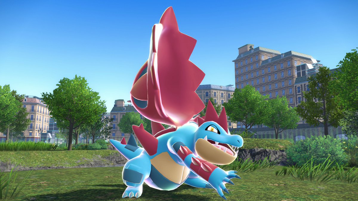 Pokemon's tweet image. Mega Evolution has made Feraligatr’s dorsal fin gigantic. Using that fin together with the power of its arms, it now boasts a “bite” at least 10 times more powerful than Feraligatr could manage before Mega Evolving. 

🐊 #PokemonLegendsZA – Mega Dimension