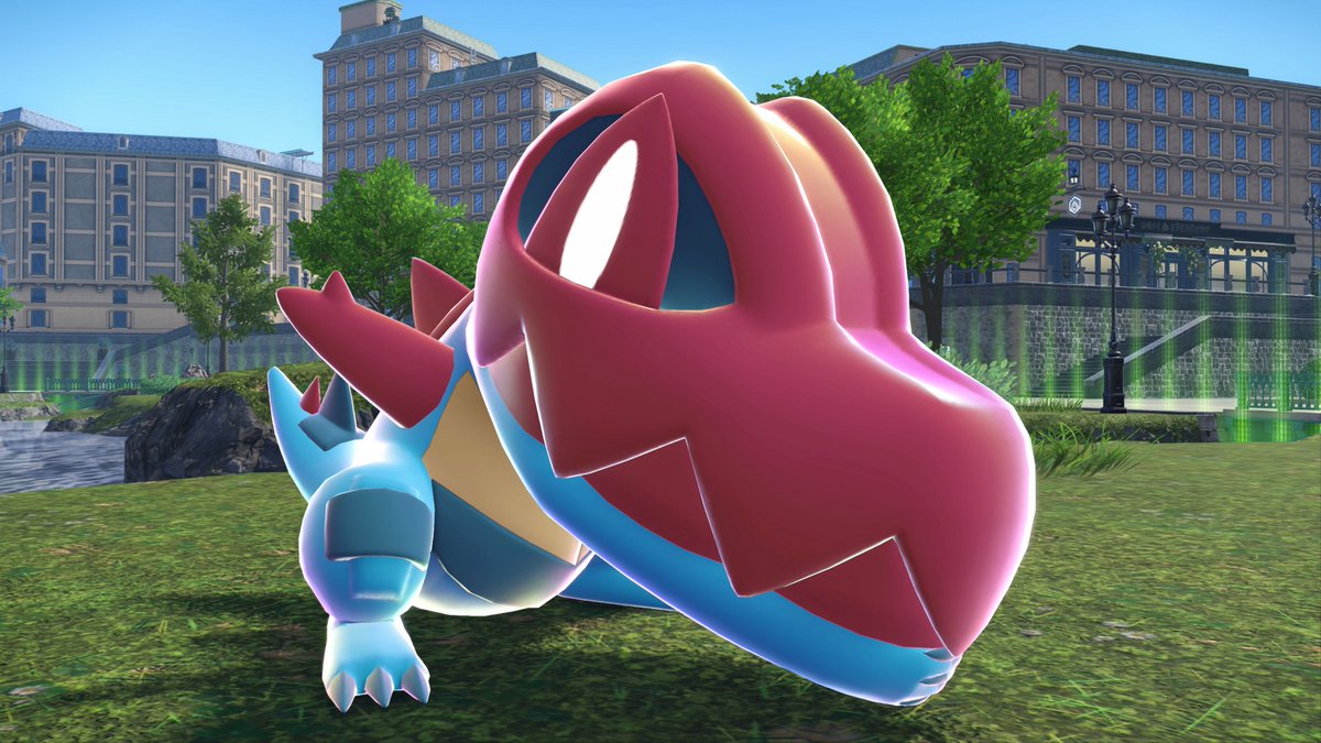 Pokemon's tweet image. Mega Evolution has made Feraligatr’s dorsal fin gigantic. Using that fin together with the power of its arms, it now boasts a “bite” at least 10 times more powerful than Feraligatr could manage before Mega Evolving. 

🐊 #PokemonLegendsZA – Mega Dimension