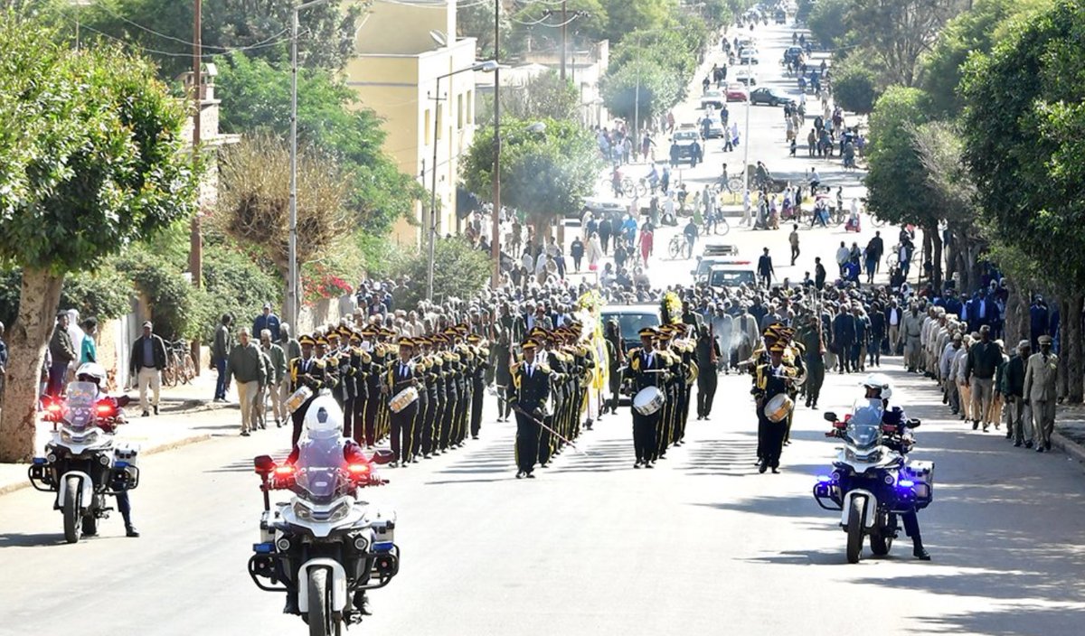 shabait's tweet photo. Funeral Service of Veteran Fighter Fesehaye Haile

The funeral service of veteran freedom fighter Fesehaye Haile (Afro), Governor of the Central Region, was held at Asmara Martyrs Cemetery today at 10:00 a.m. in the presence of President Isaias Afwerki, Ministers, senior government and PFDJ officials, Army Commanders, family members, and a large number of nationals.

Veteran freedom fighter Fesehaye Haile, who passed away on 4 November at the age of 78 due to illness, was one of the heroes produced by Eritrea’s struggle for independence. He devoted 52 years of his life to achieving national independence, safeguarding national sovereignty, and contributing to the nation-building process.

He joined the Eritrean People’s Liberation Forces in July 1973 after serving as a member of the “Tihisha” agitational group from 1972 to 1973.

During the armed struggle for independence, he served his nation and people with utmost dedication in various capacities, including as a combatant in the Eritrean People’s Liberation Army, and in the EPLF Departments of People’s Administration and Intelligence and Security.

After independence, veteran freedom fighter Fesehaye continued to serve his country as Deputy Governor of Asmara; Executive Director of the Northern Red Sea Region; Director General of the Customs Department at the Ministry of Finance; Director General of Civil Aviation; and Governor of the Gash-Barka and Central Regions, respectively.

President Isaias Afwerki laid a wreath on the tomb of veteran fighter Fesehaye Haile; Mr. Yemane Gebreab on behalf of the PFDJ; Ambassador Abdella Musa, Governor of the Anseba Region, on behalf of the Ministry of Local Government; Mr. Zerit Tewoldebrhan on behalf of the Central Region; and Mr. Gideon Fesehaye, son of the veteran fighter.

Veteran freedom fighter Fesehaye is survived by his wife and three children.

Expressing deep sorrow over the passing away of veteran freedom fighter Fesehaye Haile, the Ministry of Local Government conveys condolences to families and friends.