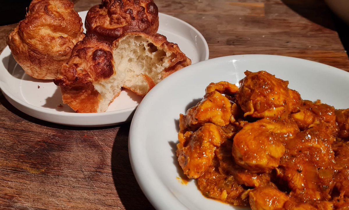 Homemade chicken curry with Homemade Yorkshire puddings on the side in lieu of naan. Don't tell me it's wrong until you've tried it. All from scratch.