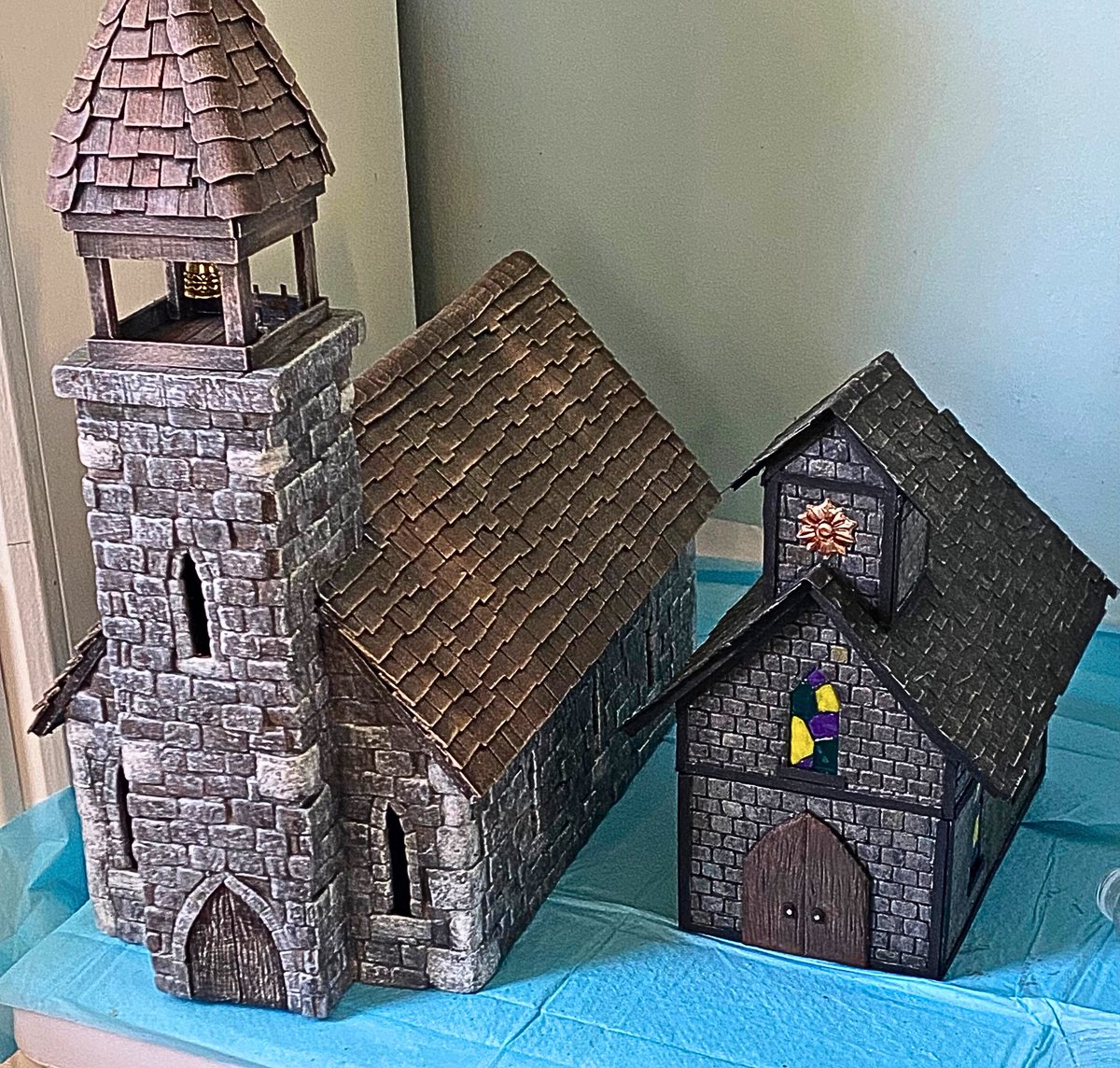 letterperfectG's tweet photo. Finished church project. 1st pic is final, 2nd  is with lights, and third pic is the difference one year makes, as it shows the new church (not quite finished), against one I made when I first started. #terrain #dndterrain #dungeonsanddragonsminiatures #dungeonsanddragons #dnd https://t.co/iCwr3uNgow