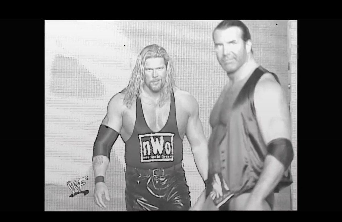 catchpitt's tweet photo. Was just randomly watching WrestleMania 18… then I hit pause.
Took me a second — and then I realized I had accidentally created an epic shot.

@RealKevinNash @KayfabeSean #asknash @KliqThisPodcast 

The look. The aura. The nWo. 🖤🤍 https://t.co/T5W14QDyMv