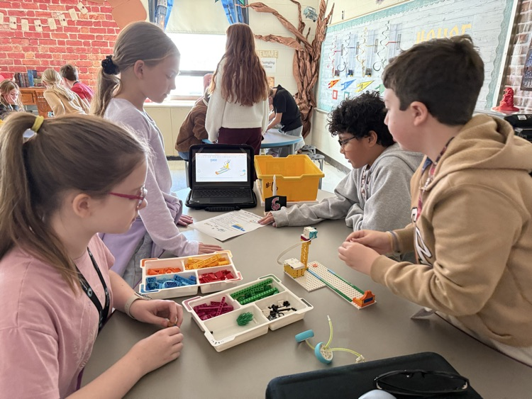 ButtsRoadInt's tweet photo. BRI's 5th graders are exploring force, motion, and energy this week with Lego Spike Robotics kits &amp; coding.  They built mini-golf courses and programmed them to achieve a hole-in-one. Finding that "just right" amount of force is more difficult than it looks.  Way to SOAR, Hawks! https://t.co/iVww2Wu8SF