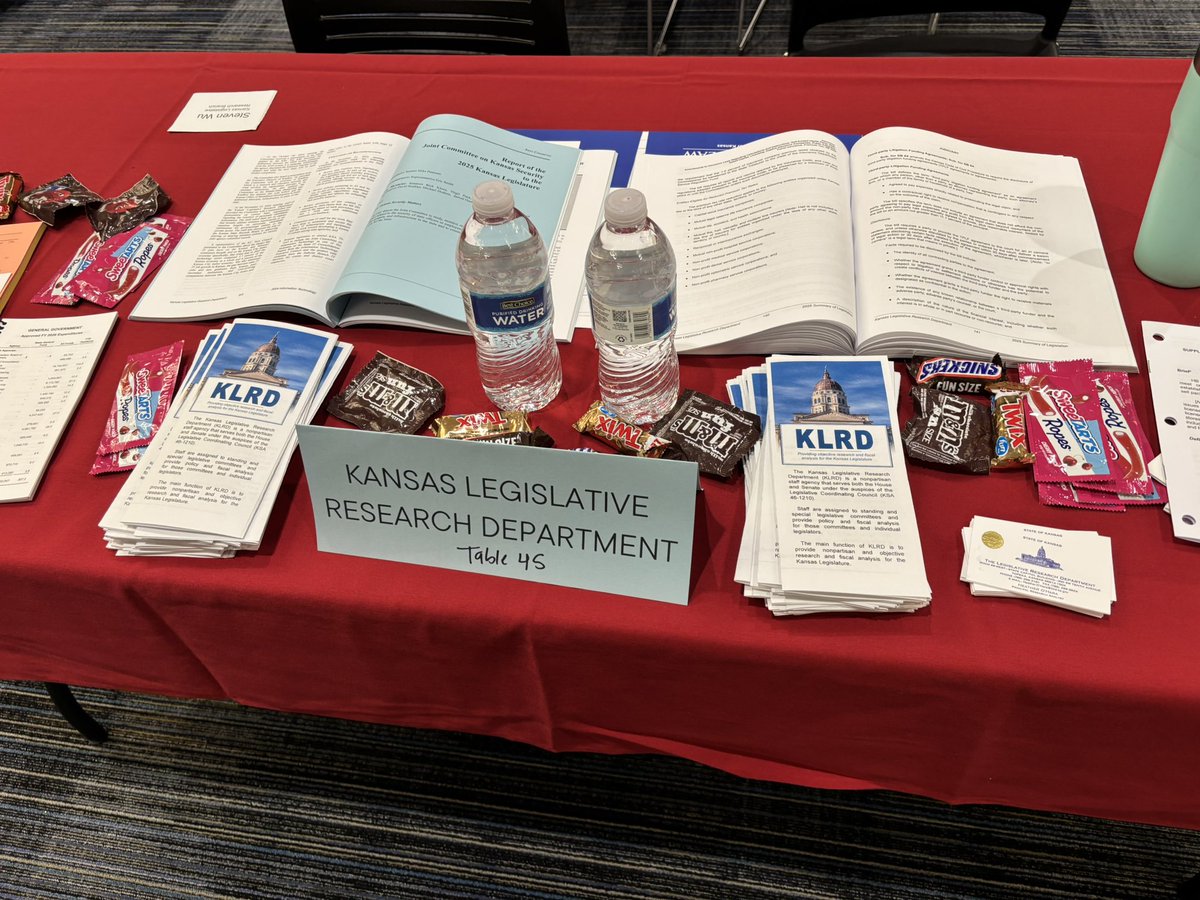Repping <a href="/KSLegResearch/">KS Leg Research Dept</a> at the <a href="/kulawschool/">KU School of Law</a> career fair tonight! Leftover candy and a stressful amount of paper will be our winning strategy, I’m sure! #ksleg