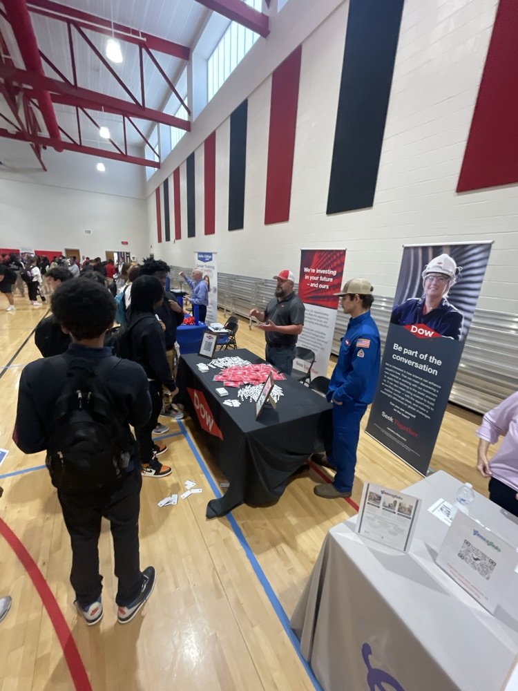 Interesting pics from College/Career Day 
1. Pat &amp; Aubrey, Nicholls commitments with the Nicholls rep
2. Johnovan with Mom, Ms. Nicole '98, she was with RPCC
3. Coach  Mailhes was with the WBR Sheriffs Office 🤔
4. Representing Dow Chemical were 2 BHS grads, Dustin '01 &amp; Beau '24