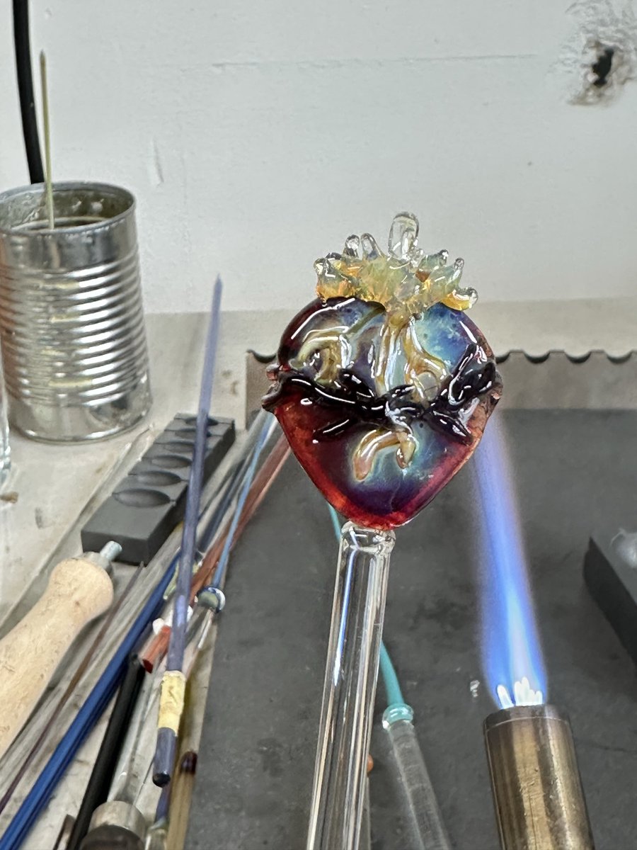 Lampwork glass heart with fire and thorns. These are super tricky to make. What do you think? Should I make more? 

Other hearts and things on Etsy found here: deeniewallaceart.etsy.com