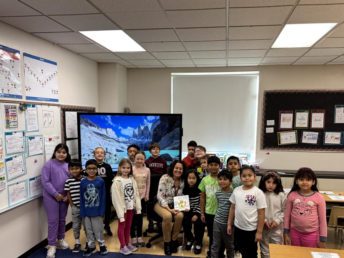 Principal Sylvester reading to a 2nd grade classroom today!