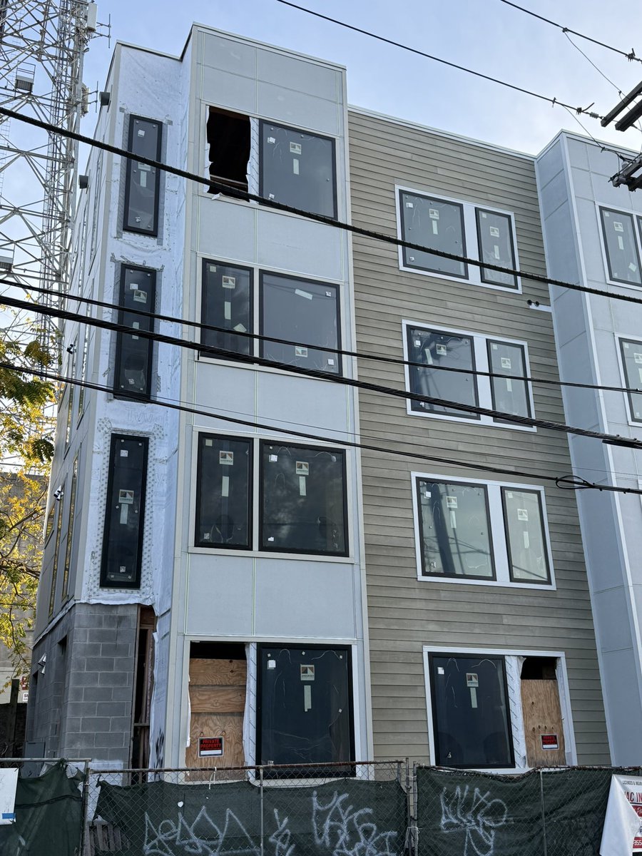 The new condos being built at the corner of 41st &amp; Chesapeake Streets have been under construction for a few years, in an on-again, off-again way. 

2 1/2 years ago the building even suffered a partial collapse (no injuries).

Now, work has been quiet and the partly finished
