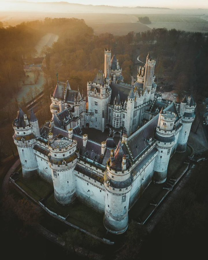 Almost everything you see today originates from a major restoration in 1857, overseen by Napoleon III.

The original version of the castle was damaged in 1617 by King Loius XIII, in response to a rebellion of nobles against the young monarch.