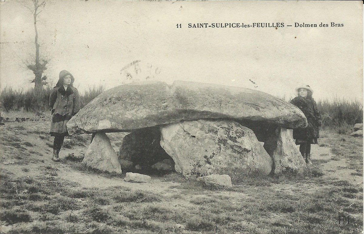 The dolmen of La Pierre Levée near Le Bras in St-Sulpice-les-Feuilles (Haute-Vienne) has a 3.6m long capstone; a groove across the top is probably from quarrymen trying to split it. This card by a publisher with the initials P.M. c.1913.