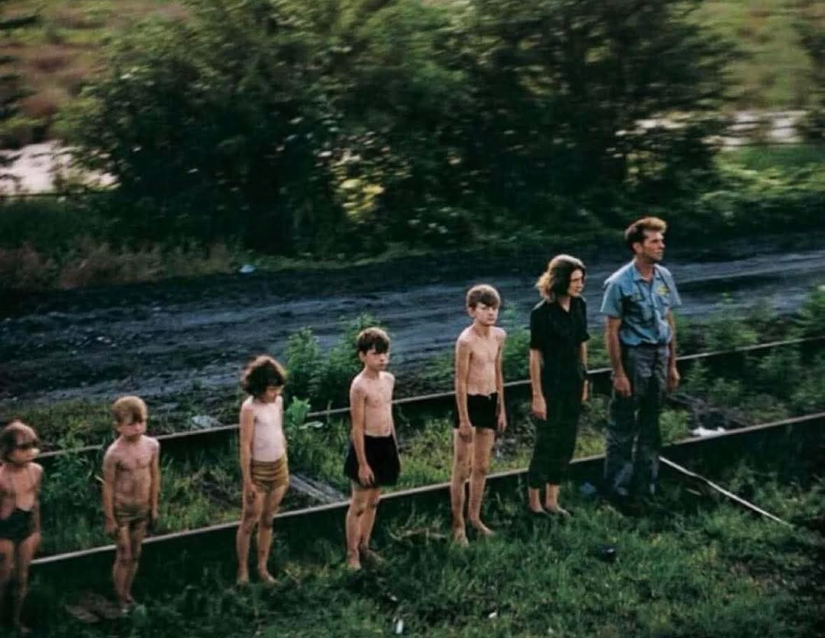 archeohistories's tweet image. A poor rural family stands at attention for Robert F. Kennedy’s funeral train, June 8, 1968....

As Robert F. Kennedy’s funeral train moved slowly from New York to Washington, D.C., on June 8, 1968, it carried not just the body of a senator, but the weight of a nation's…