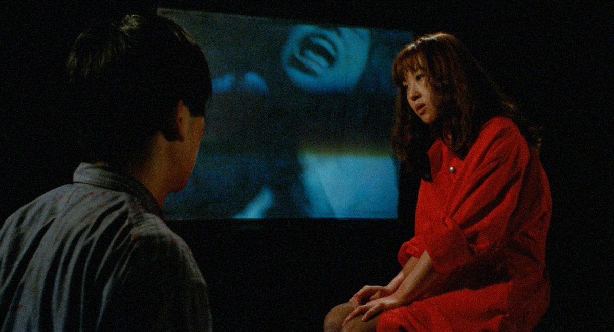 Hisayasu Satō’s Re-Wind aka Celluloid Nightmares is very much my kind of movie. A fantastically weird, blood-soaked techno-nightmare told through camcorder haze and CRT static. What more could you ask for?