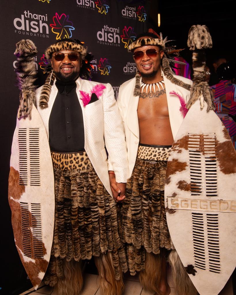 dailysunsa's tweet photo. π₯ LOVE CONQUERS ALL! Crosby and Sean just WON Cutest Couple at the Feather Awards after being SLAMMED for their Zulu wedding. Their message to haters? "UNPACK YOUR BAGS - we're staying!" πͺπ πΏπ¦ #FeatherAwards #LoveWins #PrideSA #CrosbyJodwana #SeanNhlapo https://t.co/TI3R8NlRBT