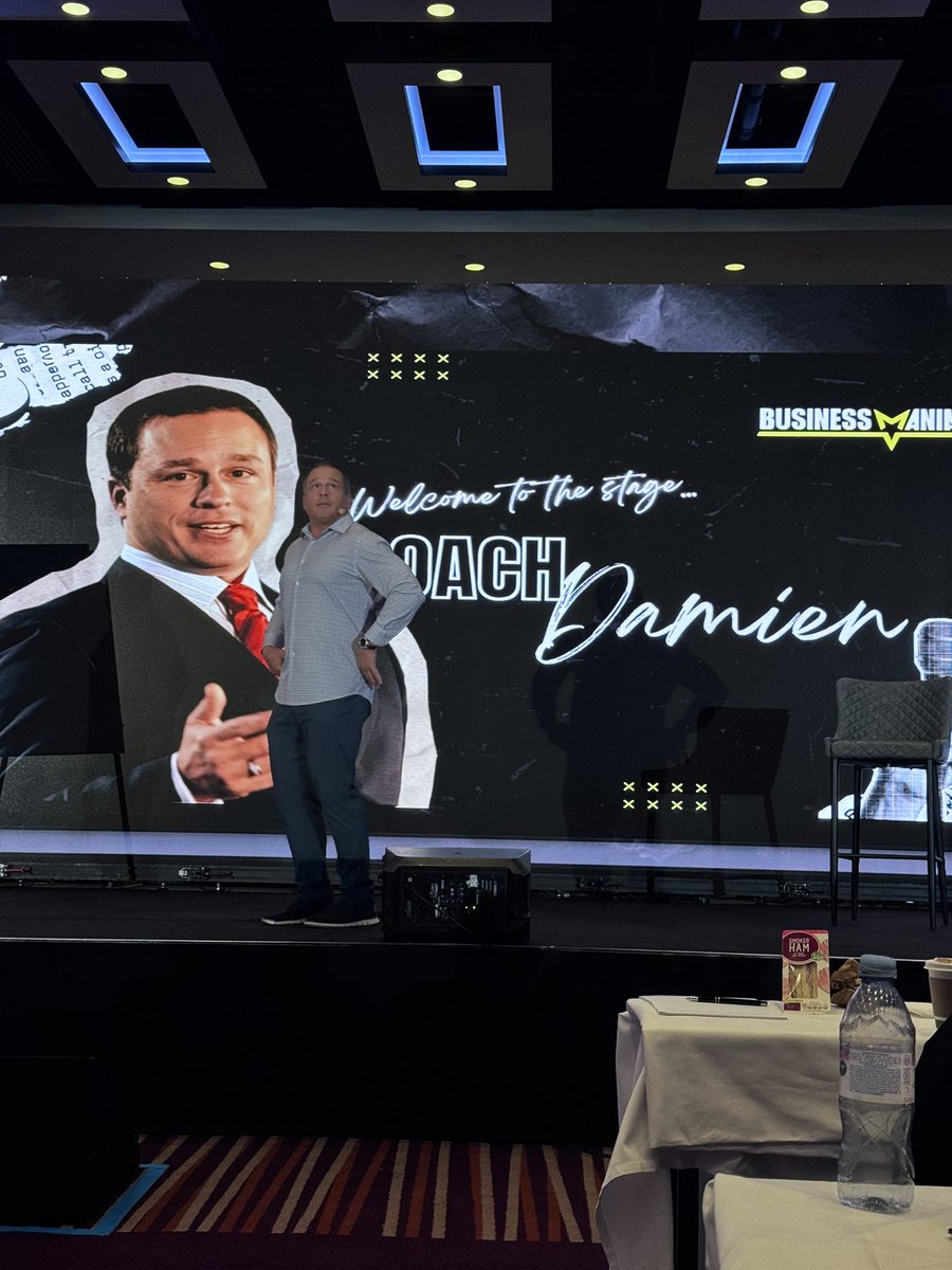 Day 2 of Business Mania 2025….Coach Damien on stage. Apparently he’s shy, eats like a gorilla and will push you out of an aeroplane 🙈 #EntrepreneurLife #EntrepreneurMindset #gemstonedetective