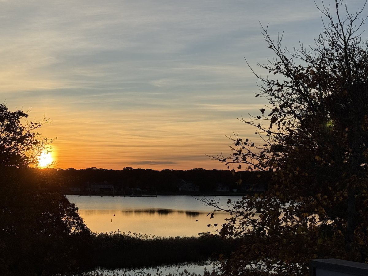 Sunrise this morning over Cape Cod. Perfectly calm ocean and salt pond #CapeCod #capecodlife #sunrise