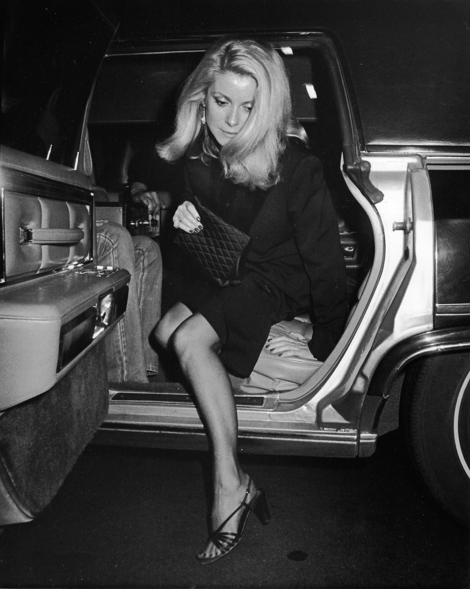 Catherine Deneuve arriving at a party for François Truffaut at the New York Film Festival, The Rock Lounge, New York, 1980.

Photographed by Ron Galella.